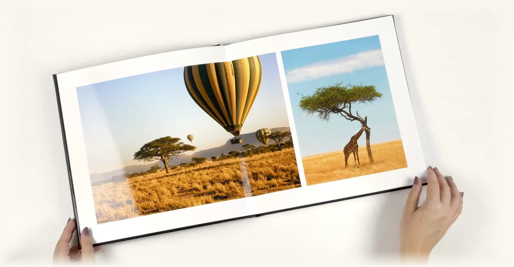A MakeAlbum 30 × 30 cm layflat photo book held open at a safari spread