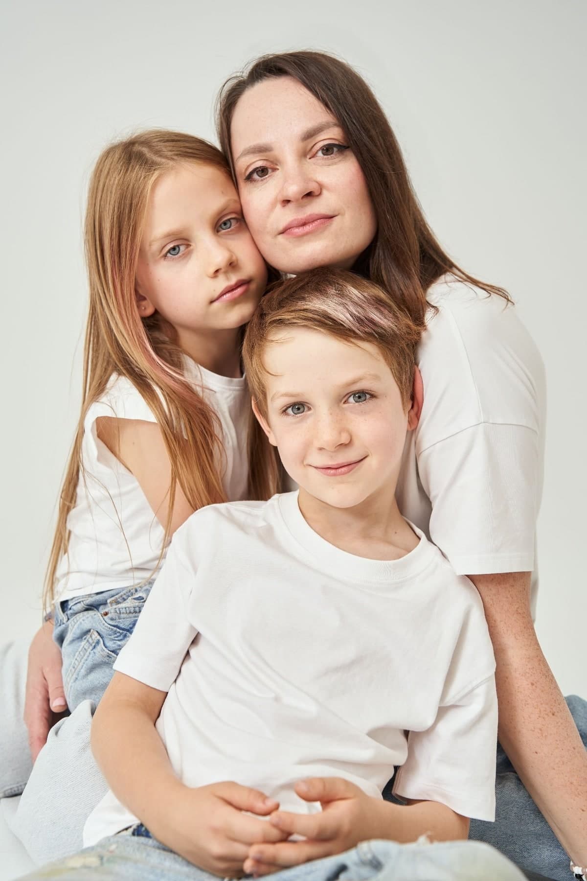 Studio portrait of a mother with her two children
